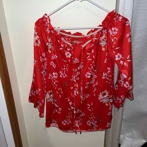 Floral off the shoulder long sleeve dress shirt. Has a tie in the front.